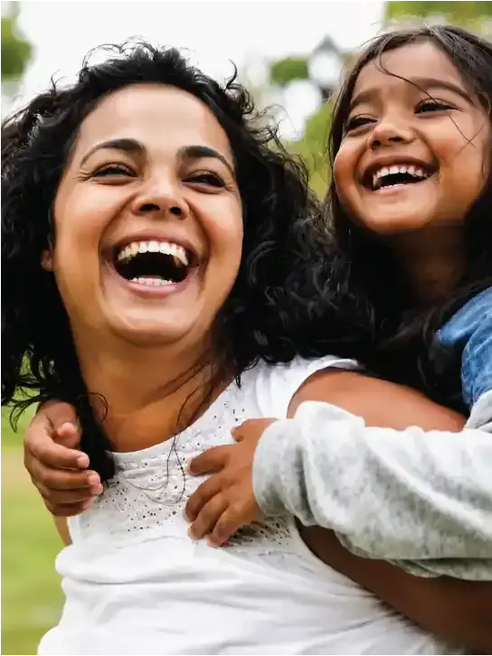 happy-indian-mother-having-fun-with-her-daughter-outdoo